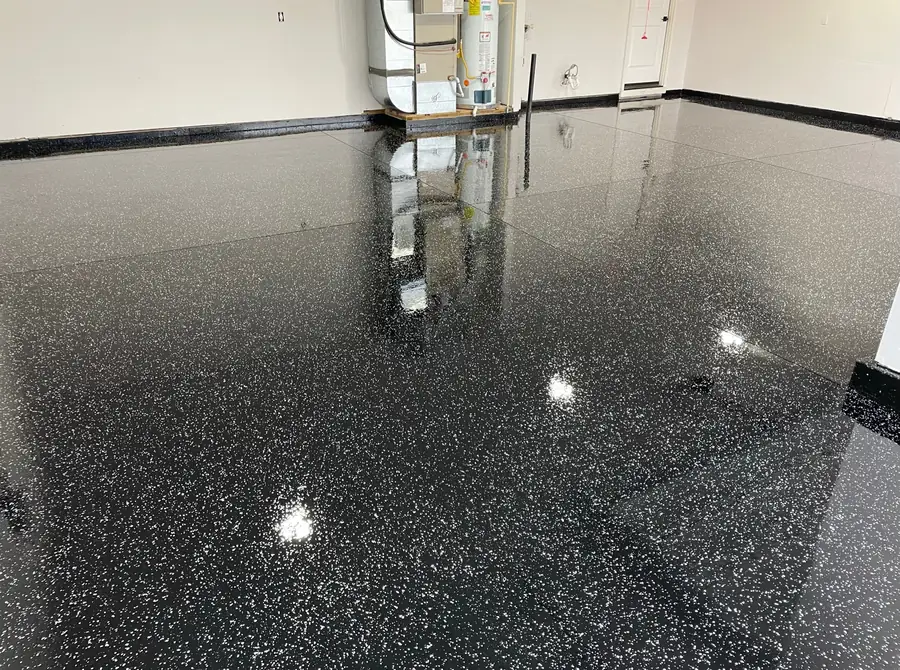 Glossy black and white flake floor