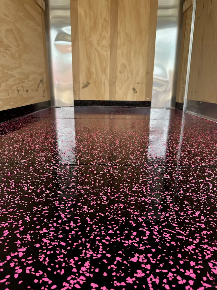 Black floor coating with hot pink flake