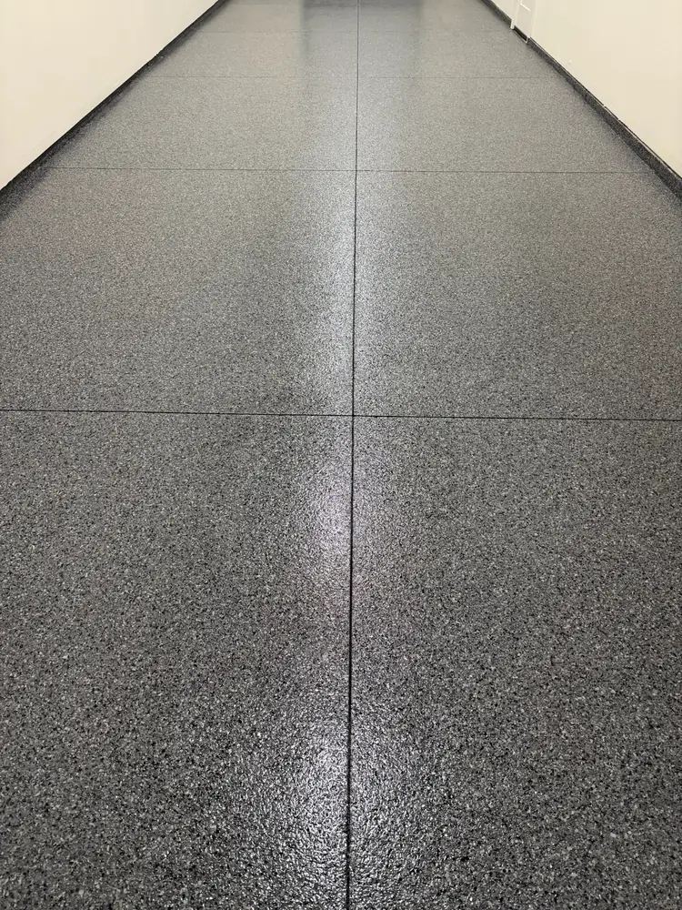 Gray flake floor coating with clean control joints